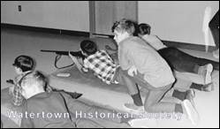 A group of people sitting on the floor

Description automatically generated with low confidence