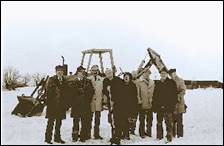 A group of people standing in the snow with snow on their heads

Description automatically generated with low confidence