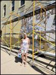 A person standing in front of scaffolding

Description automatically generated